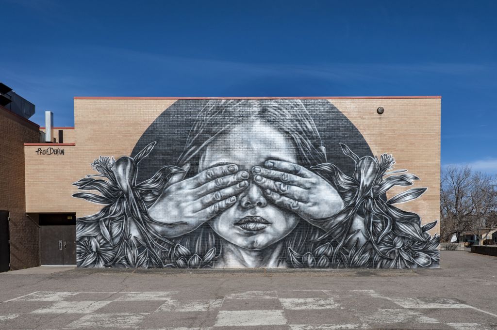 Go to the Untitled (black and white image of woman covering her eyes) page