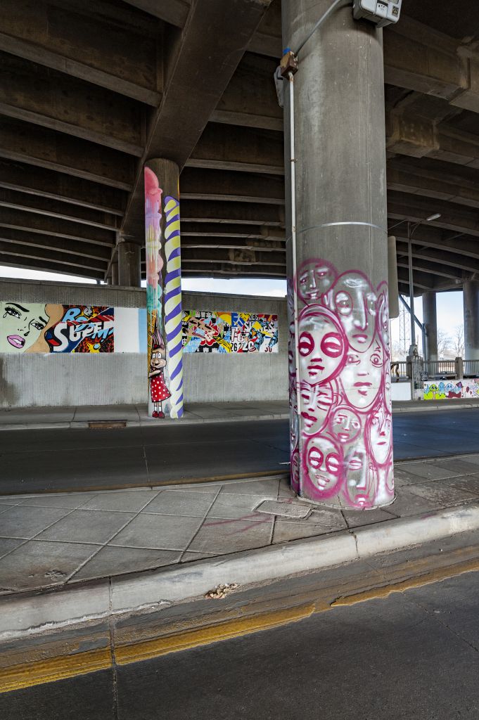 Go to the Untitled (concrete columns - pink faces, blue and green candle, bunny with ice cream cone) page
